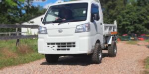 Off-road Japanese kei truck on a farm track