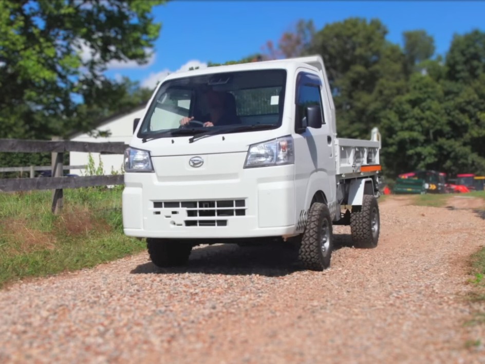 Off-road Japanese kei truck on a farm track